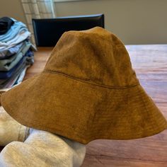 Excellent Condition. Never Worn Adjustable Curved Brim Bucket Hat For Fall, Adjustable Wide Brim Bucket Hat For Fall, Adjustable Fall Sun Hat, Adjustable Beige Bucket Hat For Fall, Adjustable Bucket Hat For Fall, Adjustable Bucket Sun Hat For Fall, Adjustable Brown Bucket Sun Hat, Adjustable Bucket Hat For Fall Beach Outings, Brown Wide Brim Sun Hat For Everyday