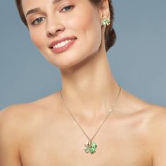 What could be more appropriate this St. Patrick's day than a gold plated jewelry set in the form of a four leaf clover? This stunning pendant and matching earrings are crafted in luxurious yellow gold plate and polished to a bright shine. Shimmering green Diamondeau®, flawless simulated diamond sit at the heart of each piece. Good Luck Clover, Clover Pendant, Faith Jewelry, Clover Earrings, Four Leaf, Sapphire Stone, Stunning Earrings, Plated Jewelry, Yellow Sapphire