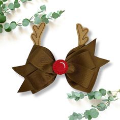 Our best Christmas seller is back! Complete your little girls holiday outfit with this adorable reindeer hair bow!  Each bow is handmade with grosgrain ribbon affixed with an alligator clip with an anti-slip grip. The ends are heat treated to prevent fraying. Each bow measures about 4.5 inches in length not including ribbon tail. Please note: We do our best to accurately represent the colors of our products, however please note that color of product may slightly very due to device/monitor screen settings. Reindeer Hair, Girls Holiday Outfit, Holiday Hair Bows, Girls Holiday, Holiday Hair, Christmas Hair Bows, Bow Christmas, Christmas Hair, Holiday Hairstyles