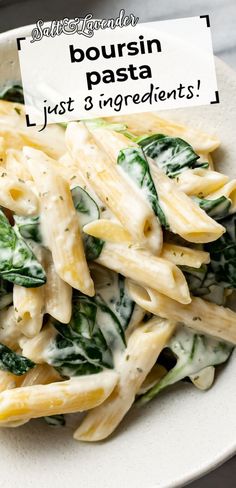 a white plate topped with pasta and spinach covered in cheese sauce next to a sign that says boursin pasta just 3 ingredients