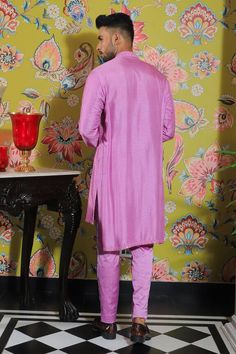 Flamingo pink kurta with mirror embroidery all over. Paired with a trouser.
Components: 2
Pattern: Embroidered
Type Of Work: Mirror
Neckline: Band collar
Sleeve Type: Long
Fabric: Silk, Stretch Cotton
Color: Pink
Occasion: Mehendi and Puja - Aza Fashions Pink Mirror Work Sherwani For Festivals, Pink Sherwani With Mirror Work For Festivals, Bollywood Style Pink Sherwani With Mirror Work, Pink Bollywood Sherwani With Mirror Work, Festive Pink Sherwani For Puja, Pink Chanderi Sherwani With Zari Work, Pink Sherwani With Mirror Work In Straight Kurta Style, Festive Pink Kurta For Puja, Pink Sherwani For Puja And Diwali