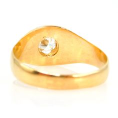 A nearly half carat round diamond is held in place with six gold prongs in this oversize Belcher style ring. Perfect for unisex wear, the Belcher style setting is a classic, elegant design named after its creator, Thomas Belcher. The top measures 10 mm in width, the shoulders 7.84 mm, and the band tapers to 3.46 mm at its narrowest point (the bottom). Metal: 14K Yellow Gold Main Stone: 1 Round Brilliant Diamond (approx. 0.43ct, H color, SI2 clarity, 5.0 x 2.79mm) Ring Size: 10.0 (can be sized) Classic Elegant, Gold Price, Brilliant Diamond, Suede Shoes, Round Brilliant, Round Diamond, Elegant Design, Round Diamonds, Fine Jewelry