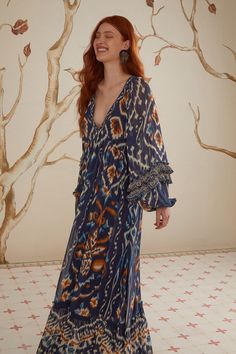 Blue Bohemian Maxi Dress For Fall, Long Sleeve Ikat Print Beach Dress, Blue Floor-length Beachwear Dress, Floor-length Blue Beachwear Dress, Bohemian Blue Dress With Vibrant Print, Blue Bohemian Dress For Fall, Bohemian Blue Dresses With Vibrant Print, Blue Bohemian Dress With Vibrant Print, Bohemian Blue Printed Midi Dress