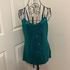 New Without Tags. No Shelf Bra Straps Are Adjustable. Longer Length Than These “Modern” Crop Tops Express Is Selling Now. Very Stretchy Very Sparkly & Glamorous! 18” Bust 16” Waist 25” Length Green Tank Top For Night Out, Green Sleeveless Sequin Top, Green Camisole Top For Party, Green Stretch Sequined Tops, Green Sequined Stretch Tops, Green Cami Top For Night Out, Green Cami Tank Top For Night Out, Fitted Green Tank Blouse, Green Tank Camisole For Party