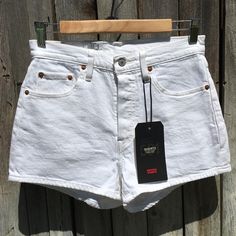 Levi’s 501 High Rise Jean Shorts In In The Clouds White Classic 501 Original High Waist Denim Shorts In Stretch Denim With Button Fly High Rise Button Fly Five Pocket Stretch Denim Pairs Easily With Sandals, Sneakers And Boots Approx Waist 14” Rise 11” Inseam 2.5” Nwt Smoke And Pet Free Home Classic White Shorts With Belt Loops, White Classic Short Bottoms, Classic White Shorts, Classic White Short Length Bottoms, White Shorts With Belt Loops, Classic High Waist White Shorts, White Short Bottoms With Belt Loops, White Short Length Bottoms With Belt Loops, Classic High Waist Jean Shorts With Belt Loops