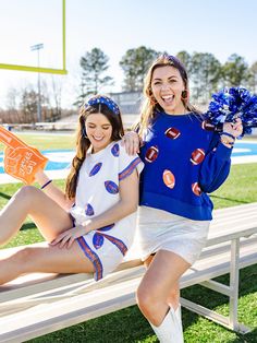 The Millie Sweatshirt features sparkling sequin footballs, radiating team spirit. Crafted from a lighter-weight version of our best-selling sweatshirt, the Millie offers a cool and comfortable alternative for those sunny game days and cool game nights. Model is 5’7” and wearing size S. Sizing: XS = 2-4 | Bust 34”-36", Waist 25”-27”, Hips 35"-37" S = 6-8 | Bust 36"-38", Waist 29"-31", Hips 37"-38.5" M = 8-10 | Bust 39"-41", Waist 31"-33", Hips 39"-41" L = 12-14 | Bust 41"-43", Waist 33"-35", Hips 41"-43" XL = 16-18 | Bust 48"-50", Waist 40"-44", Hips 50"-52" XXL = 20-22 | Bust 52"-56", Waist, 46"-48", Hips 54"-56" Details: Slightly cropped length Full volume sleeves Sequin embellished football icons Fabric is a light weight version of our classic soft sweatshirt Overall relaxed fit 83% Poly Embellished Sweatshirts, Summer Pajamas, Scalloped Trim, Summer Set, Comfy Shorts, Short Pajama Set, Pajama Shorts, Blue Orange, Drawstring Waist