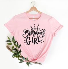 🎈 Happy birthday! Show up to your next birthday party in style with this eye-catching pink t-shirt that declares "Birthday Girl" for the lady of the hour! Or, a perfect gift for a friend for a night out on the town. This just might be the softest and most comfortable women's t-shirt you'll ever own. Combine the relaxed fit and smooth fabric of this tee with jeans to create an effortless every-day outfit with our birthday shirts, or dress it up with a jacket and dress pants for a business casual Pink Letter Print Top For Birthday, Pink Crew Neck Top For Birthday, Pink Graphic Print Top For Birthday Gift, Pink Casual T-shirt For Party, Casual Pink T-shirt For Party, Casual Pink Party T-shirt, Pink Birthday Tops With Text Print, Pink Birthday Top With Text Print, Pink Birthday T-shirt With Name Print