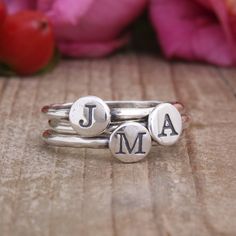 "Mix and match! Stack and spell! Say whatever you want with these stacking initial rings. Spell a child's name, stack your initials, or get one initial for each grandchild. **The price listed is for one sterling silver stacking ring but if you want more, you can change the quantity** These rings also look great stacked with our birthstone rings, find them at this listing: https://www.etsy.com/listing/192036913 ♥♥ HOW TO ORDER ♥♥ 1. FROM THE DROP DOWN BOX SELECT THE SIZE AND QUANTITY OF RINGS 2. Personalized Initial Ring, Silver Initial Ring, Initial Rings, Birthstone Stacking Rings, Mothers Ring, Diamond Wedding Jewelry, Family Rings, Sterling Silver Stacking Rings, Letter Ring