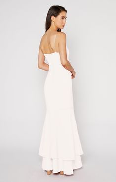 Juxtaposing the simple straight neck and straps, this flowy, double-tiered, mermaid-style gown will make a statement at every formal event.The Aurora Gown in white is a "soft white". Fit Details FittedLinedFit-and-flare silhouetteZipper and button closure on backDouble layer ruffle hem73% Polyester 22% Rayon 5% Spandex Dry Clean Only ImportedMeasurementsLength: 62.75in/159.39cm, from top edgeMeasurements from size 4 White Grad Dress Long, White Graduation Dress Long, Spring Formal Dresses Long, White Formal Dress Long, Long White Flowy Dress, White Graduation Gown, White Grad Dress, Aurora Gown, White Formal Gowns