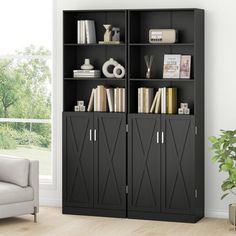 a living room with a couch and bookcase