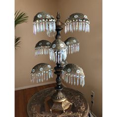 a chandelier on top of a table in a room