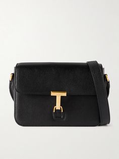 A sophisticated messenger bag like TOM FORD's brings so much to an outfit. Suspended from a sleek shoulder strap, it's made from supple textured-leather and has a boxy shape with plenty of room for your wallet, sunglasses and cologne. The gold-tone 'T' clasp makes a great focal point. Messenger Bag For Men, Leather Messenger Bag Men, Black Toms, Ford Accessories, Tom Ford Men, Latest Bags, Messenger Bag Men, Crossbody Messenger Bag, Leather Messenger Bag