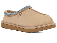 UGG Tasman - Men's Slippers : Sand/Santorini : Casual, yet rugged, classic slipper. The Tasman always fits tight at first especially if someone has a high instep or high volume foot. It does stretch out over time. If you are in between sizes, please size up or down based on the volume of your foot and height of your instep. The UGG Tasman is a casual, yet rugged, classic slipper. Sheepskin laminated to cow suede adds durability to uncompromised comfort. Sheepskin laminated to cow suede adds dura Bape Shoes, Ugg Tasman Slippers, Classic Slippers, Slippers Online, Men's Slippers, Ugg Tasman, Shoe Wishlist, Funky Shoes, Comfortable Slippers