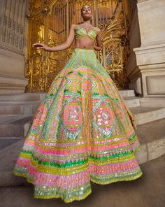 This lehenga set features multiple tones of bright yellow, green and pink in varying shapes and sizes. The outfit is paired with an embroidered strappy blouse and a matching net dupatta.From Seema Gujral's Love Notes From Paris Collection DELIVERY TIMEPlease allow 8-12 weeks for your outfit to arrive. FABRIC DETAILSNet Professional cleaning only. Lime Lehenga, Neon Sequin, Strappy Blouse, Sequin Lehenga, Seema Gujral, Mehndi Outfit, Sangeet Outfit, Mehendi Outfits, Padded Blouse