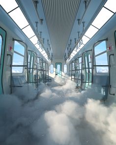 the inside of a train with its doors open and some clouds in the foreground