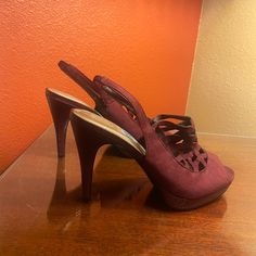 Brand New, Size 8.5 Us. Shoe Has 4" Heel And 1" Platform. Purple Suede Material On Top, Around Strap, And On Heel. Back Strap Stretches For Adjustability And Support. Burgundy Synthetic Heels For Party, Burgundy Synthetic Party Heels, Burgundy Synthetic High Heels, Burgundy Closed Toe Synthetic Heels, Strap Stretches, Navy Blue Pumps, Jeweled Heels, Burgundy Heels, Cutout Heels