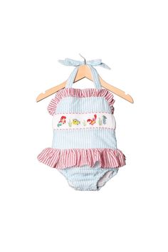 The Smocked Flamingo is a boutique specializing in children’s clothing for every occasion. Striped Ruffled Swimwear For Poolside, Striped Ruffle Swimwear, Gingham Ruffled Swimwear For Poolside, Gingham Swimwear With Ruffles For Poolside, Summer Cotton Swimwear With Ruffles, Fitted Gingham Playful Swimwear, Seersucker Swimwear For Beach Season Vacation, Spring Seersucker Swimwear For Poolside, Playful Gingham Swimwear For Spring