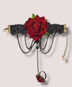 "Rose Seduction": Explore your wild side with Rose Seduction - the daring rose bracelet and ring combo. Feel the power of the dripping black chains as you make a bold statement and capture attention. Be daring, be bold! Rise to the challenge. Mitten bracelet is approximately 9.5". Bracelet with extender Valentine's Day Punk Party Jewelry, Black Jewelry For Valentine's Day Party, Edgy Black Body Jewelry For Gift, Edgy Black Body Jewelry For Gifts, Adjustable Punk Body Jewelry For Party, Edgy Jewelry For Valentine's Day Party, Edgy Adjustable Body Jewelry For Parties, Adjustable Edgy Body Jewelry For Parties, Rose Jewelry For Valentine's Day Party