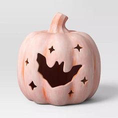 a carved pumpkin with stars on it