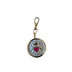 Sacred heart charm with charm clip. Wearing this sacred heart charm with charm clip is a beautiful reminder to live with compassion and grace. Each time you see it, it will serve as a small yet powerful way to keep your heart open and full of love for yourself and others. Attach to any necklace or chain. Accents nicely.Charm: Stainless steel, 18KT Gold platedCharm Clip: 18KT GP, Brass, 17mmShips from Akron, Ohio Keep Your Heart Open, Love For Yourself, Eyes Game, Akron Ohio, Full Of Love, Sacred Heart, Initial Charm, Drop Necklace, Chain Ring