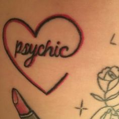 a tattoo with the word psychic written on it and a pencil in front of it