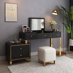 a desk with a mirror, stool and potted plant on it in a room