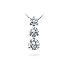 Proudly made in the USA, this diamond pendant is set in white gold and features three graduated round cut diamonds (0.04ct, 0.08ct and 0.15ct) in a three prong setting. Suspended by a white gold cable-link chain with your choice of length. Approximately 1/3 carat total weight. Diamond Size Chart, Top 10 Engagement Rings, Solitaire Pendant Necklace, Three Stone Diamond, Heart Diamond, Natural Diamond Engagement Ring, Custom Ring Designs, Heart Pendant Diamond, Wedding Ring Designs