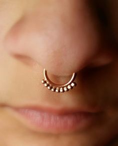 Septum ring / Nose RingWith 1.5 mm ballsSeptum ring,septum clicker 14g 16g Inner Diameter : 6mm, 7mm, 8mm. Materials: 14k Solid gold, White Solid gold . Hoop Helix Piercing, Cuff Piercing, Piercing Daith, Double Tongue Piercing, Ear Cuff Piercing, Nose Septum, Gold Nose Hoop, Double Cartilage Piercing, Septum Nose Rings