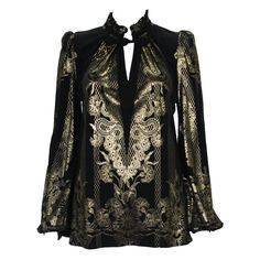 New Roberto Cavalli Gold Print Blouse Designer size 38 ( oversized - please check measurements) Black with Gold Print, Long Sleeve, 100% Viscose, Toggle Button Closure. Measurements: Length - 27 inches, Bust - 36/38", Sleeve - 26". Made in Italy. New with tag. Retail $1295.00 Luxury Black Blouse For Fall, Designer Gold Tops For Workwear, Designer Gold Blouse For Workwear, Designer Gold Tops For Work, Designer V-neck Tops For Fall, Designer Silk Blouse For Fall, Designer V-neck Party Top, Designer V-neck Blouse For Party, Designer Long Sleeve Blouse For Evening