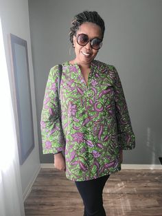 This beautiful African print tunic is made out of 100% wax cotton. It is an easy pull on top with no zippers or buttons. It can be worn for any occasion by styling it differently. Include your measurements in the order notes so we can make sure you are selecting the right fit. DETAILS & CARE - Full Length 30 inches - Sleeve length 24 inches - V-neck - Three-quarter sleeves - Pleat in the back - 100% wax cotton - Hand or machine wash cold recommended to preserve color brilliance Ladies Long Top, Kitenge Fashion, Top With Long Sleeves, Womens Blouses, African Wax Print, Fit Details, African Design Dresses, Wax Print, African Attire