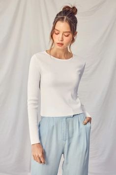 Idem Ditto Twisted Backless Long Sleeve Knit Top – Ply Style Chic Ribbed Top For Spring, Chic Ribbed Long Sleeve Top With Stretch, Chic Ribbed Spring Top, Spring Long Sleeve Top, Chic Fitted Ribbed Crop Top, Chic Fitted Long Sleeve Fine Knit Top, Chic Fine Knit Long Sleeve Top For Spring, Chic Ribbed Fitted Knit Top, Fitted Fine Knit Long Sleeve Top For Spring