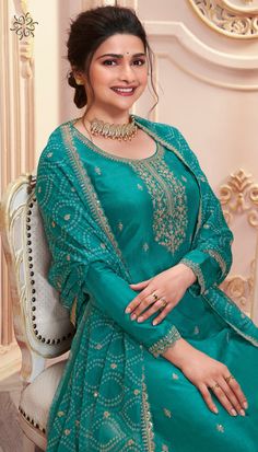 Fabric Details :- Top :- Silk Georgette with Embroidery WorkBottom :- SantoonDupatta :- Chinon with Embroidery Top Length :- Max up 40" to 42" InchesSize :- Max up to 48" InchesWork :- Heavy Embroidery WorkStyle :- Salwar Kameez Pant SuitsType :- Ready to WearWash :- First Time Dry Clean Bollywood Green Palazzo Set With Embroidered Border, Green Bollywood Palazzo Set With Embroidered Border, Green Palazzo Set With Embroidered Border For Eid, Green Palazzo Set With Embroidered Border For Wedding, Wedding Green Palazzo Set With Embroidered Border, Green Semi-stitched Sharara With Embroidered Border, Semi-stitched Green Sharara With Embroidered Border, Bollywood Style Green Sharara With Embroidered Border, Green Long Sleeve Salwar Kameez With Embroidered Border