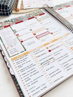 an open planner sitting on top of a table