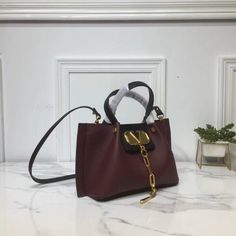 SHOP MORE LUXURY PRODUCTS HERE Description Valentino Small Vlogo Escape Dark Red, For Women, Women’s Bags 16.1in/41cm Size: 41 x 25 x 18 cm /16.1 x 9.8 x 7.1 inches (Width x Height x Length) Made of textured with VLOGO plaqueAdjustable and removable shoulder strapTwo handlesFront detail with magnetic closureFinish hardwareNon-removable front detail Includes dust bag.This product is of the premium quality. Burgundy Bag With Detachable Strap And Double Handle, Burgundy Satchel With Handles For Shopping, Burgundy Top Handle Shopping Bag, High-end Red Shoulder Bag With Double Handle, Red Double Handle Shoulder Bag For Work, Modern Burgundy Shoulder Bag With Dust Bag, Designer Burgundy Bag With Handles, Designer Burgundy Shopping Bag, Luxury Burgundy Tote Satchel