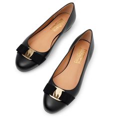 Black leather ballet flats from Ferragamo. The Varina ballet flats are made of calfskin leather, featuring a rounded toe with a signature leather bow complete with a gold-tone metal buckle and heel measuring 0.5cm.Leather soleTrue to sizeMade in Italy Black Leather Ballet Flats, Leather Bow, Leather Ballet Flats, Leather Bows, Ballet Flat, Soft Black, Ballerinas, Metal Buckles, Gold Tone Metal