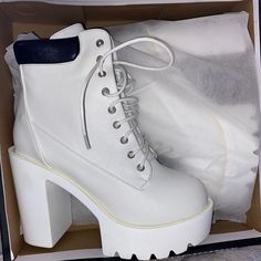 White Chunk Boots ! Very Comfortable , Fits True To Size And Can Be Styled Different Ways . White Lace-up Casual Heels, Casual White Lace-up Heels, White High Heel Boots For Streetwear, Casual Round Toe Heeled Boots For Streetwear, Casual White High-top Platform Boots, Casual High-top Heeled Boots For Streetwear, White Lace-up Chunky Platform Heels, White Chunky Platform High Ankle Boots, Trendy Round Toe Heeled Boots For Streetwear