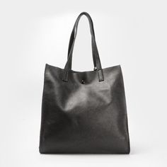 Genuine leather vertical shopper bag.  It is the tote bag you were looking for, as it is the classic bag to carry everything and use it daily, lightweight and spacious.  It is made of cowhide leather, the closure is automatic.  It includes a zippered toiletry bag that will allow you to organize all your belongings, and you can remove it whenever you want.  It is the ideal bag for every day!  Size: width 30 cm x height 30 cm x 12 cm deep. Genuine Leather Totes, Classic Bags, Shopper Bag, Leather Tote Bag, Toiletry Bag, Cowhide Leather, Leather Tote, Genuine Leather, Spain