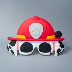 Bring the heroic spirit of Adventure Bay to life with Marshall Paw Patrol Sunstaches, the perfect accessory for fans of the courageous Dalmatian firefighter! These playful sunglasses feature Marshall's distinctive red firefighter hat, instantly transforming you into the beloved Paw Patrol character. Ideal for young adventurers and costume enthusiasts alike, these Sunstaches are perfect for birthday parties, dress-up play, or adding a fun touch to everyday wear. With 100% UV protection, they not Dalmatian Firefighter, Skye Paw Patrol Costume, Skye Costume, Marshall Costume, Firefighter Hat, Costume Glasses, Paw Patrol Marshall, Rubble Paw Patrol, Classic Halloween Costumes