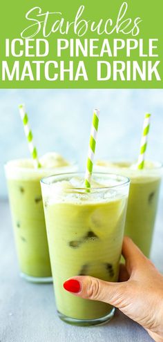 starbucks iced pineapple matcha drink in two glasses with green and white striped straws