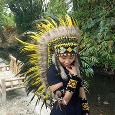 Yellow Feather Indian Headdress Replica This Headdress is 100% handmade from feathers. * Head circumference: 59 centimeters / 23 inches * Length : Medium * Beads color and pattern may vary each headdress WHY US? * 100% Handmade and Eco Friendly Product * Finest Quality - Each item will go through a Quality Control process before shipping. * No Markup Price * Every purchase supports Balinese Artisans - All Artisans will keep on following their passions while providing for their families. SHIPPING Bohemian Fitted Costume Hats And Headpieces For Festival, Bohemian Fitted Festival Costume Hats And Headpieces, Fitted Feather Costume Hat, Carnival Festival Costume Hats With Feathers, Bohemian Costume Hats And Headpieces With Feathers For Festivals, Bohemian Festival Hats And Headpieces For Carnival, Festival Costume Hat With Feathers, Festival Feathered Costume Hat, Festival Costume Hats And Headpieces With Feathers