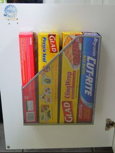 a metal holder with candy bars in it