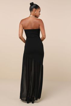 The chic essence of the Lulus Exemplary Sensation Black Strapless Asymmetrical Maxi Dress will command everyone's attention when you strut into the room! Stretchy crepe knit shapes this stunning dress that features a straight neckline and a darted, strapless bodice (with hidden no-slip strips) and a flirty mesh side cutout that lends a stunning effect. High, fitted waist sits atop tops a bodycon skirt that continues down to an asymmetrical seam and ends at a sheer mesh maxi hem. Fit: This garmen Fitted Strapless Dress With Asymmetrical Neckline For Night Out, Asymmetrical Stretch Maxi Dress For Night Out, Chic One Shoulder Dress With Asymmetrical Hem For Prom, Chic One-shoulder Dress With Asymmetrical Hem For Prom, Fitted Strapless Dress With Asymmetrical Hem For Cocktail, Strapless Asymmetrical Dress For Summer Nights, Flirty Strapless Maxi Dress For Date Night, Chic Asymmetrical Strapless Evening Dress, Fitted Asymmetrical Maxi Dress For Night Out