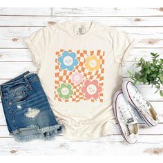 Looking for a cute versatile top to wear? Make sure to grab one of our Graphic tees! This soft and comfortable graphic tee is the perfect top for any outfit. It can be paired with biker shorts, jeans, or even a simple skirt/dress! This tee is true-to-size, so be sure to order your regular t-shirt size! If you are looking for a more oversized look, make sure to size up! High Neck Tank Top, Slim Fit Shorts, Workout Tank Tops, Casual Fit, Blue Jean, Casual Fits, Vintage Look, Heavy Weight, Air Dry