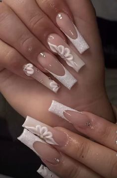 Ombre And French Tip Acrylic Nails, Prom Nails Flower Design, Black 3d Flower Nails Acrylics, Nails With French Tip And Flowers, Nails Acrylic With 3d Flowers, Elegant Long Acrylic Nails, White Nails For Quinceanera, Nails Acrylic Coffin Flower, White French Tip Nails With 3d Flower