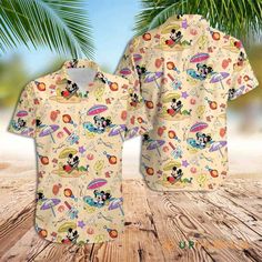 Mickey Aloha Shirt Mickey Mouse Hawaiian Shirt Summer Mickey And Minnie Mouse Best Hawaiian Shirts The Hawaiian shirt embodies the spirit of laid-back elegance. With its vibrant, tropical patterns and lightweight fabric, it captures the essence of leisure and relaxation. These shirts, often made from breathable materials like cotton or silk, boast colorful floral or nature-inspired designs, reflecting the beauty of the islands. Their loose, comfortable fit and short sleeves make them ideal for w Beach Season Multicolor Camp Shirt With All Over Print, Multicolor Shirt With All-over Print For Beach Season, Multicolor All-over Print Hawaiian Shirt For Beach Season, Multicolor Hawaiian Shirt With All Over Print, Hawaiian Multicolor Top With All Over Print, Hawaiian Multicolor Tops With All Over Print, Beach Cotton Shirt With All Over Print, Tropical All Over Print Tops For Beach Season, Patterned All-over Print Camp Shirt For Vacation