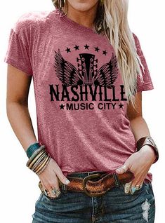 PRICES MAY VARY. T-Shirt Tops Features: Nashville vintage style tshirt. Trendy country music city shirt with a little boho shirt tee, retro guitar wings graphic tees show your rock 'n' roll and country spirit. Girls trip to nashville shirts, country concert t shirt, band music patry shirt, casual loose tees, short sleeve shirt tops, letter print shirt. T-Shirt Tops Material: This nashville music t-shirt is 80%cotton+29%polyester, soft comfortable ,high quality boutique, constructed of a light we Nashville Shirts, Country Tops, Retro Guitar, Vintage Graphic Tees, Country Music Shirt, Nashville Music, Graphic Band Tees, Style Tshirt, Country Music Shirts