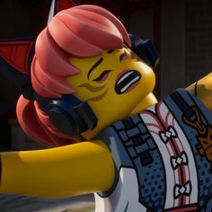 the lego movie character is wearing headphones and holding his arms out in front of him