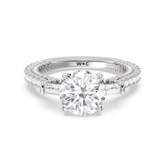 a white gold engagement ring with diamonds on it