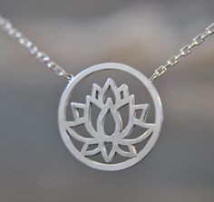 Fantastic and spiritual... This lotus necklace is part of our new spring collection. It is made of 925 sterling silver and has a simple lotus flower motif, which will be the perfect addition to your outfit. The lotus flower is the symbol of purity of heart, creativity, faithfulness and enlightenment. Love and life are also among the long list of meanings ascribed to this majestic flower. To give a precious feeling to your mother, girlfriend or yourself, this necklace would be the perfect gift choice. Be it as a Christmas gift, birthday gift, Mother's Day gift or even bridal jewelry. It is also available in a set with a bracelet, earrings and ring, making them the perfect gift idea for your loved ones. You can find the products under the following links: https://www.etsy.com/de/listing/1200 Silver Hypoallergenic Flower Necklace, Sterling Silver Flower Pendant Necklace For Everyday, Everyday Sterling Silver Necklace With Flower Pendant, Hypoallergenic Silver Jewelry With Flower Pendant, Hypoallergenic Silver Flower Pendant Jewelry, Spiritual Sterling Silver Jewelry With Birth Flower, Minimalist Sterling Silver Flower Charm Necklace, Adjustable Sterling Silver Necklace With Flower Charm, Adjustable Sterling Silver Flower Charm Necklace