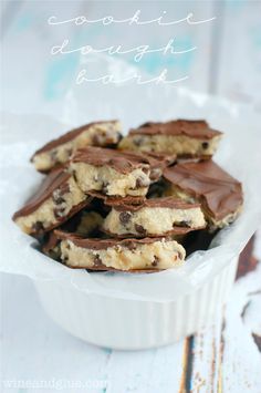 chocolate chip cookies are in a white bowl